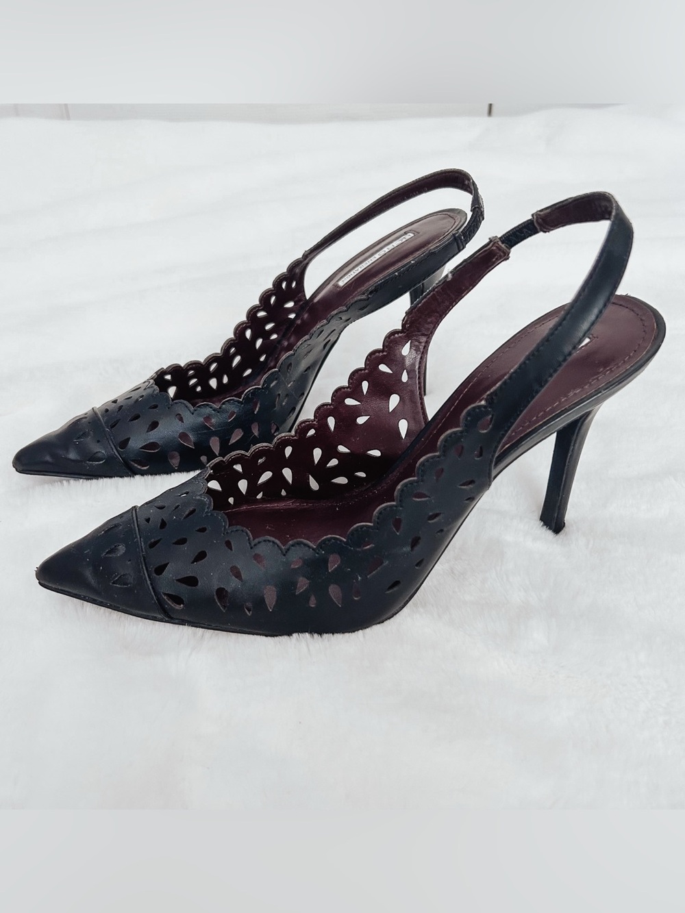 BCBGeneration Black Pointed Slingback Heels with Perforated Scallop Detail